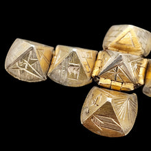 Load image into Gallery viewer, Gold and silver masonic cross pendant on a black background
