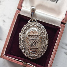 Load image into Gallery viewer, Silver pendant with intricate design in an antique jewellery box
