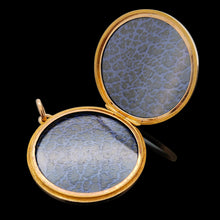 Load image into Gallery viewer, A circular yellow gold locket with pinstripe engraving, open
