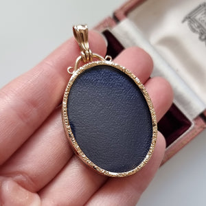 Antique 9ct Yellow Gold Double-Sided Open Locket in hand