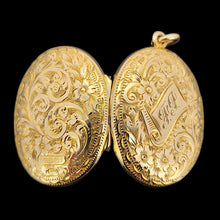 Load image into Gallery viewer, An intricately engraved oval locket in yellow gold, with a banner with monogrammed initials reading FP

