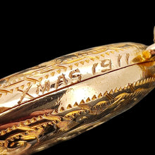 Load image into Gallery viewer, Close-up of hand-engraving reading XMAS 1911 on a yellow gold locket
