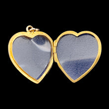 Load image into Gallery viewer, A yellow gold heart shaped locket, open
