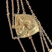 Load image into Gallery viewer, Gold necklace with intricate design on a black background
