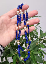 Load image into Gallery viewer, Lapis Lazuli and Freshwater Pearl Necklace in hand

