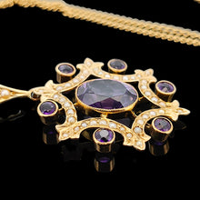 Load image into Gallery viewer, An amethyst and seed pearl fancy pendant in yellow gold with a curb link chain, on a black background
