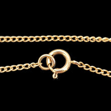 Load image into Gallery viewer, A close-up of a yellow gold chain with bolt ring clasp, on a black background
