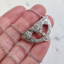 Load image into Gallery viewer, Art Deco Platinum Diamond Pendant on 9ct White Gold Chain in hand
