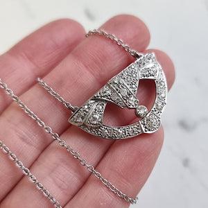 Art Deco Platinum Diamond Pendant on 9ct White Gold Chain in hand