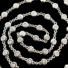Load image into Gallery viewer, A white gold round diamond station necklace, close-up
