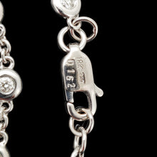 Load image into Gallery viewer, A white gold round diamond station necklace, close-up of the lobster clasp, stamped 18K 750 0162
