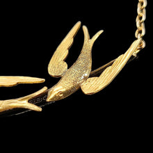 Load image into Gallery viewer, A yellow gold pendant necklace featuring two swallow birds in flight
