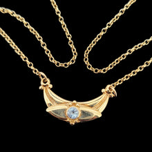 Load image into Gallery viewer, A yellow gold pendant necklace with a round aquamarine
