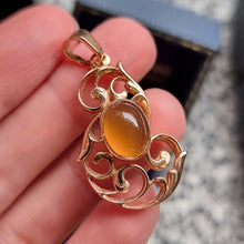 Load image into Gallery viewer, Vintage 14ct Rose Gold Chalcedony Pendant in hand
