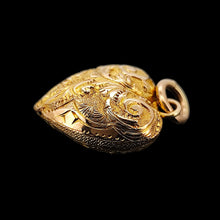 Load image into Gallery viewer, A yellow gold engraved heart shaped charm pendant
