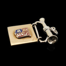 Load image into Gallery viewer, A yellow and white gold flag and bugle charm with an enamel coat of arms
