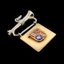 Load image into Gallery viewer, A yellow and white gold flag and bugle charm with an enamel coat of arms
