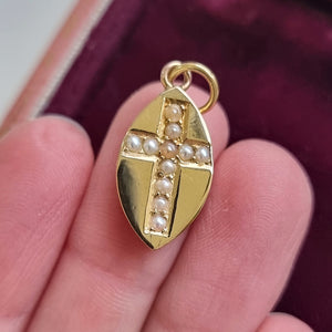 Edwardian 15ct Gold Seed Pearl Cross Pendant in hand