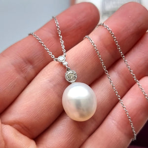 18ct White Gold Pearl and Diamond Pendant Necklace, 0.30ct in hand