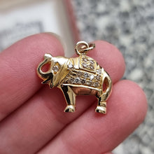 Load image into Gallery viewer, 18ct Gold Diamond Elephant Pendant in hand
