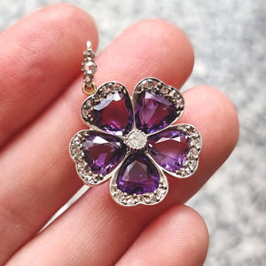 Victorian Gold & Silver Amethyst and Diamond Pansy Flower Pendant in hand
