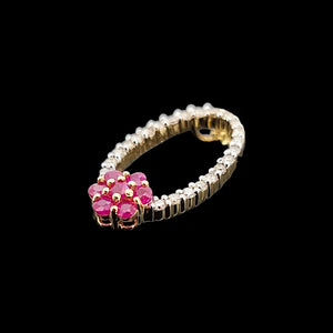 14K Yellow Gold Ruby and Diamond Cluster Pendant side view, on a black background