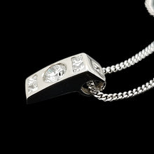 Load image into Gallery viewer, A brilliant and princess cut diamond pendant in platinum, with a white gold curb chain
