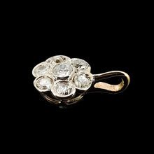 Load image into Gallery viewer, A flower shaped diamond cluster pendant in yellow gold and platinum, on a black background
