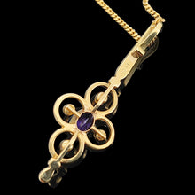 Load image into Gallery viewer, A yellow gold pendant with an oval amethyst and four white seed pearls, with a curb chain
