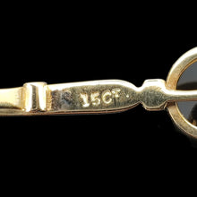 Load image into Gallery viewer, Close-up of a 15CT stamp on a yellow gold pendant
