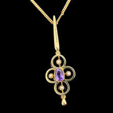 Load image into Gallery viewer, A yellow gold pendant with an oval amethyst and four white seed pearls, with a curb chain
