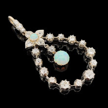 Load image into Gallery viewer, A pear shaped open pendant set with opals and diamonds, in gold and silver
