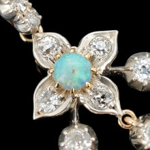 Load image into Gallery viewer, Close-up of an opal and diamond flower motif in silver and gold
