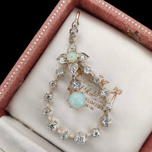 Load image into Gallery viewer, A pear shaped open pendant set with opals and diamonds, in gold and silver, in an antique box
