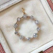 Load image into Gallery viewer, A ten stone old cut diamond open circle pendant in silver and gold, in an antique box
