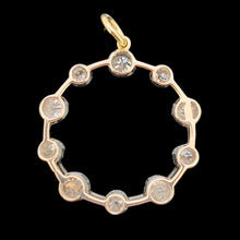 Load image into Gallery viewer, A ten stone old cut diamond open circle pendant in silver and gold
