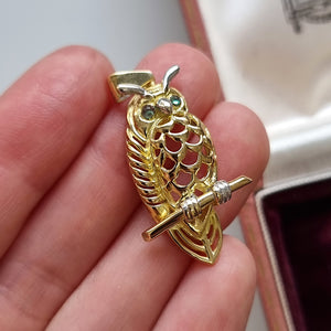 Vintage 18ct Gold Emerald Owl Pendant in hand