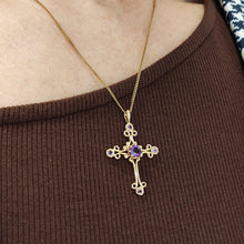 Load image into Gallery viewer, A fancy design cross pendant with five amethysts, modelled with a gold chain
