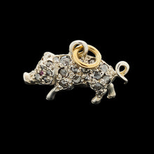 Load image into Gallery viewer, A diamond and ruby set silver pig charm with a gold jump ring

