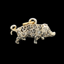 Load image into Gallery viewer, A diamond and ruby set silver pig charm with a gold jump ring
