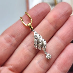 Vintage 18ct Yellow & White Gold Brilliant Cut Diamond Drop Pendant in hand with chain