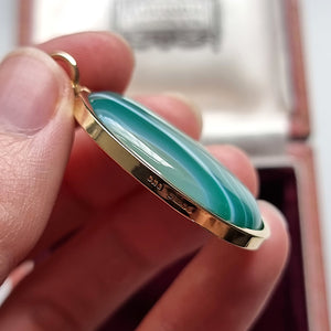 Vintage 9ct Gold Green Agate Pendant in hand