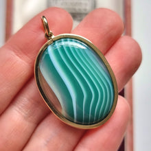 Load image into Gallery viewer, Vintage 9ct Gold Green Agate Pendant in hand
