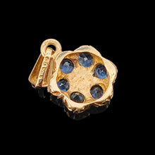 Load image into Gallery viewer, A yellow gold pendant shown from behind, on a black background
