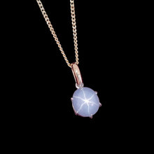 Load image into Gallery viewer, 9ct Yellow and White Gold Star Sapphire Pendant, 5.50ct on a black background
