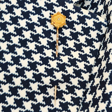 Load image into Gallery viewer, An antique diamond tie or stick pin in yellow gold, modelled on the lapel of a houndstooth pattern jacket
