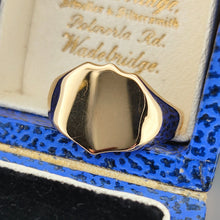 Load image into Gallery viewer, A yellow gold shield shaped signet ring, in a ring box
