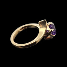 Load image into Gallery viewer, Gold ring with an amethyst on a black background
