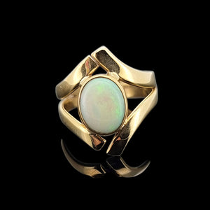 Vintage 9ct Yellow Gold Opal Crossover Dress Ring front view, on a black background