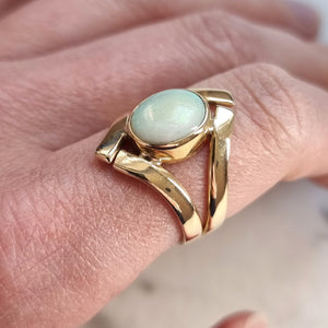 Vintage 9ct Yellow Gold Opal Crossover Dress Ring modelled on the index finger